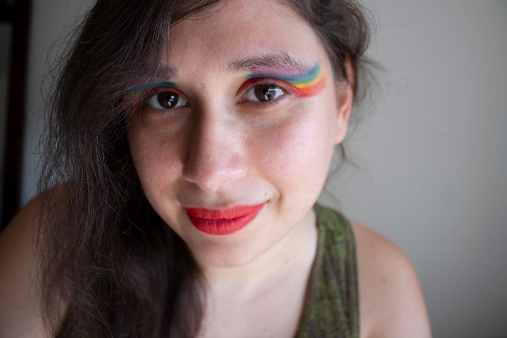 self portrait of Ellice with rainbow eye shadow